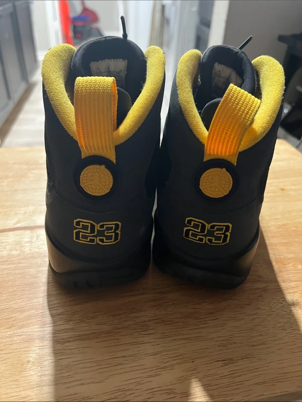 Jordan Black High-Top Sneakers with Yellow Trim